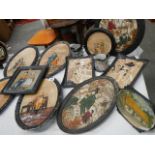 Eleven Bretby wall plaques including Japanese scenes,