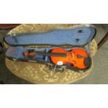 A small cased violin.