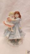 Two Royal Worcester figurines - "Love" and "Lullaby".