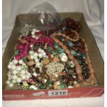 A box of beaded costume jewellery