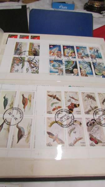 Four folders of assorted world stamps. - Image 3 of 19