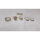 Five 9ct gold rings (total weight with stones 9.3 grams).