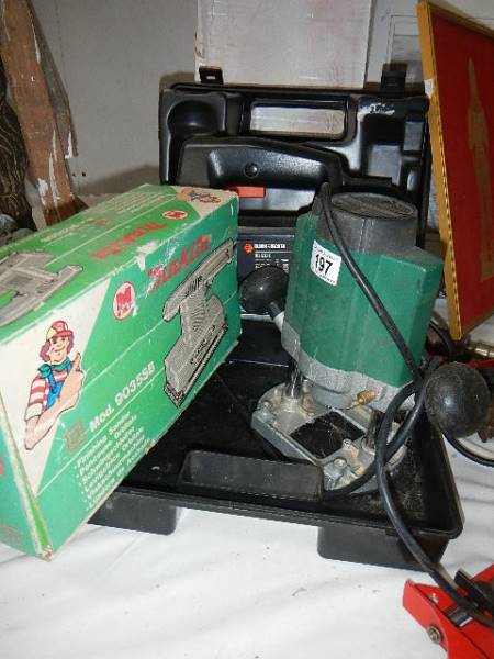 A boxed jig saw, router and sander.