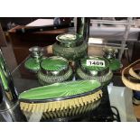 An art deco green glass chrome dressing table set