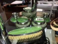 An art deco green glass chrome dressing table set