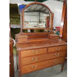 A mahogany mirror backed dressing table.