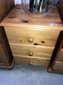 A pine 3 drawer bedside chest of drawers