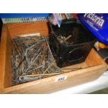 A box of assorted drill bits etc.