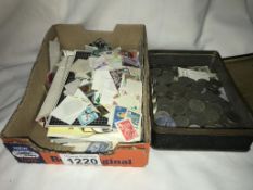 A tin of six pence coins & small lot of mixed stamps etc.