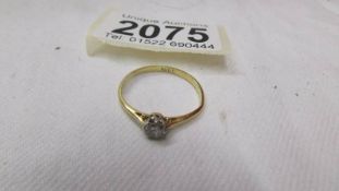 An 18ct gold ring set diamond, size O, 1.8 grams.