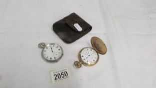 A Waltham gold plated full hunter pocket watch and a silver pocket watch with leather pouch.