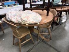 A round solid pine dining table (top not fixed) & 2 chairs with 7 cushions (table diameter 122cm x