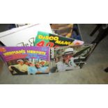 A box of assorted LP records including Elton John, Aretha Franklin, Herman's Hermits etc.