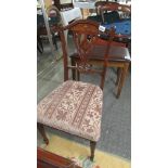 An Edwardian mahogany inlaid bedroom chair.