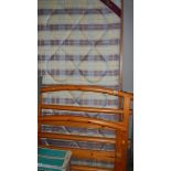 A good clean pine framed single bed.