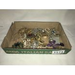 A mixed lot of brooches & earrings