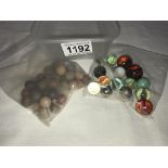 A quantity of Victorian clay marbles & other vintage marbles