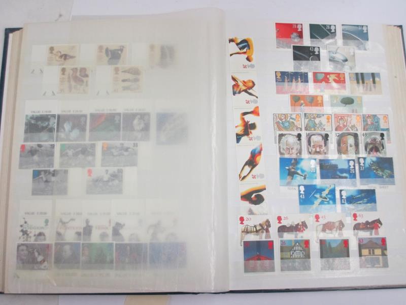 A good album of mint definitive stamps and sets (some in strips, many with gutter sides), - Image 13 of 13