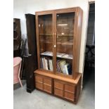 A teak Parker Knoll display cabinet with base (103cm x 46cm x 183cm high)