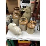 A selection of stoneware flagons & jars etc.