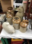 A selection of stoneware flagons & jars etc.