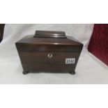 A Victorian mahogany tea caddy complete with glass mixing bowl.