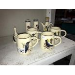 A quantity of Brixham pottery bird decorated pottery including 4 mugs,