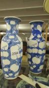 A pair of modern blue and white vases. ****Condition report**** No damage.