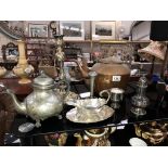A Victorian copper kettle, ornate silver plated candlestick & gravy boat on tray etc.