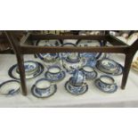 In excess of 30 pieces of Booth's 'Real Old Willow' blue and white tableware.