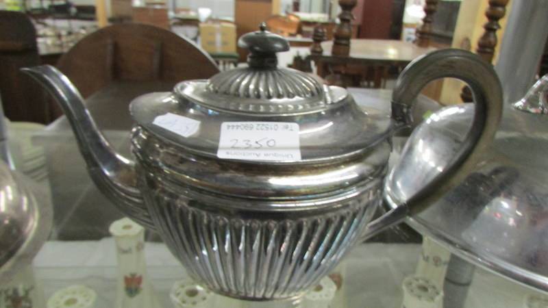 A silver plate teapot, meat cover and tureen lid. - Image 2 of 4