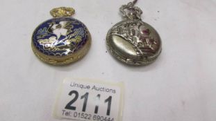 Two modern pocket watches.
