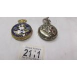 Two modern pocket watches.