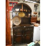 A domed top oak dresser.