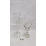 A 19th century twist stem glass and one other.