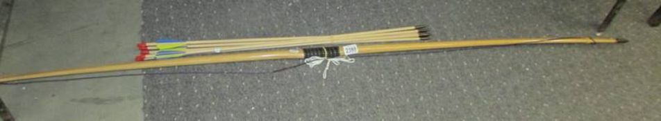 An English long bow with arrows.