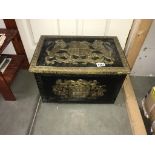 An Armorial Coat of Arms brass coal/log box.