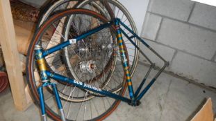 A Bob Johnson cycle frame and 4 good cycle wheels.