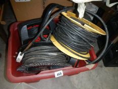 A box of extension leads.