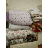 A quantity of quilts and bedcovers (collect only)
