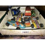 A quantity of 1950's tin plate racing cars including Tonka jeep etc.