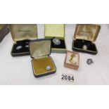 Three Wedgwood pendants, a Wedgwood brooch, a pair of Wedgwood earrings and a Wedgwood ring.