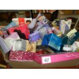 A box of miscellaneous toiletries, ladies tights etc.