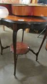 A mahogany occasional table.