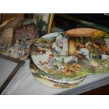 Twelve Royal Doulton collector's plates.