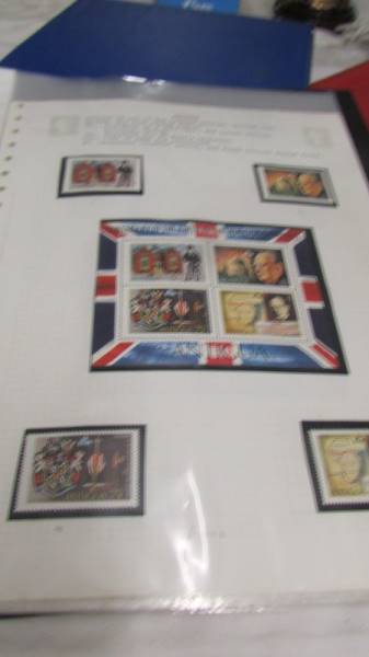 Four folders of assorted world stamps. - Image 6 of 19