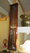 A Victorian mahogany cased barometer,