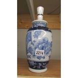 A Chinese blue and white table lamp base. 28 cm.