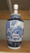 A Chinese blue and white table lamp base. 28 cm.