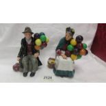 Two Royal Doulton figurines - "The Balloon Man" HN 1954 and "The Old Balloon Seller" HN 1315.